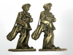 A pair of cast brass fire-side ornaments, modelled as golfers, height 35 cm.