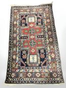 A Caucasian rug, 170 cm x 97 cm.