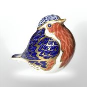 A Royal Crown Derby Robin paperweight with silver stopper.