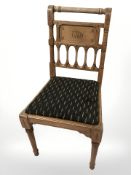 A 19th century carved walnut chair