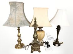 A crate of contemporary table lamps.