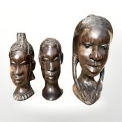 Three African carved hardwood busts, tallest 20.5 cm.