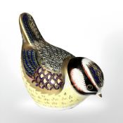 A Royal Crown Derby Blue Tit paperweight with silver stopper.
