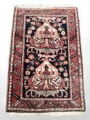 A Hamadan rug, North-West Iran, 111 cm x 73 cm.