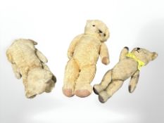 Two vintage jointed mohair teddybears and a further dog, largest 41 cm long.