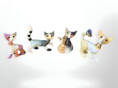 Four Goebel figures of cats, tallest 8 cm.