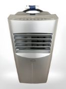 A Domair air conditioning unit, with remote, and a Vita vacuum packing machine,