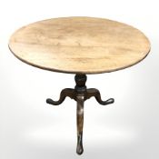 A George III mahogany tilt-top tripod table, diameter 76 cm,