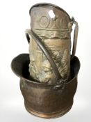 A Victorian copper coal bucket and a further embossed scuttle.