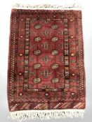 A Turkoman rug, Afghanistan, 114 cm x 74 cm.