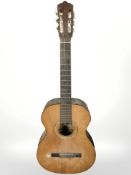 An Isabella classical guitar.