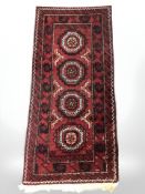A Balouch rug, Afghanistan, 100 cm x 47 cm.