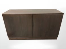 A contemporary Danish teak veneered double door sideboard,