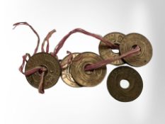 Five East Africa five cent coins.