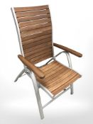 A teak and metal folding garden armchair