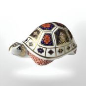 A Royal Crown Derby Tortoise paperweight, lacking stopper.