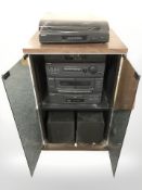 A modern audio cabinet containing Sony hi/fi system including turn table PS/LX52P,