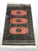 A Lahore Bokhara rug, Pakistan, 155 cm x 95 cm.