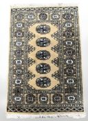 A Lahore Bokhara rug, Pakistan, 100 cm x 63 cm.