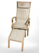 A Danish bentwood framed armchair with canvas webbing and matching footstool after a design by Finn
