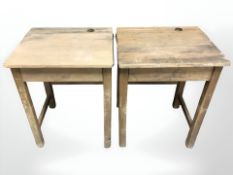A pair of early 20th century school desks,