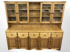 A modern glazed pine dresser,