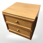 A G Plan teak two drawer bedside chest,