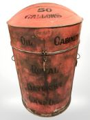An early 20th century painted and galvanised oil dispensing barrel,