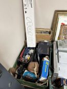 A group of photography equipment, including vintage Praktica MTL3 camera,