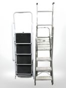 Two aluminium ladders and a further ladder