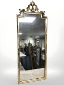 A reproduction gilt framed mirror, 147 cm x 55 cm.