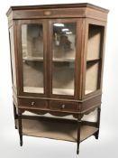 A late Victorian mahogany and satin wood banded glazed display cabinet,
