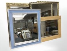Three contemporary gilt mirrors and two others,
