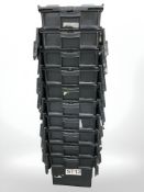 Ten plastic stackable storage boxes with folding lids,