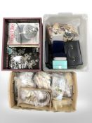 A quantity of costume jewellery, contemporary jewellery boxes and jewellery making guides.