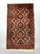A Balouch rug, Afghanistan, 76 cm x 45 cm.