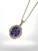 A 9ct gold amethyst and diamond cluster pendant on chain,