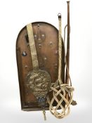 A bagatelle board, a copper horn, a carpet beater and a set of brass mounted bellows.