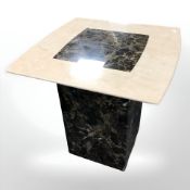 A contemporary marble effect pedestal lamp table,