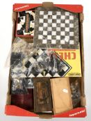 A quantity of chess sets and boards,