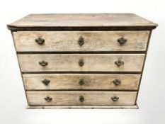 An early 19th century Danish oak four drawer chest, 125 cm x 59 cm x 92 cm.