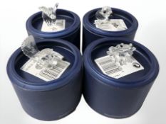 Four Swarovski crystal animal figures to include : Elephant, seal pup, frog and anteater, all boxed.