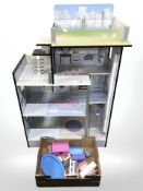 A modern doll's house and a small quantity of furniture.