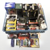 A collection of die cast model cars including Burago, Days Gone,