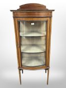 A late Victorian mahogany and satinwood-banded bow front display cabinet, 58 cm x 40 cm x 140 cm.