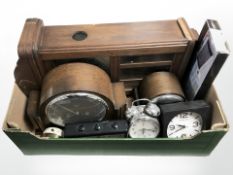 An early 20th century oak wall clock, two mantle clocks, further contemporary clocks,