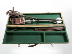 Three folding shooting sticks and wooden gun case with baize lining