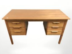 A 20th century teak and MDF twin pedestal writing desk,