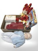 A bisque headed jointed doll, stamped Joyce Wolf, Dutch jester soft toy,