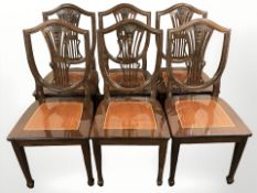 Six reproduction shield-back dining room chairs.